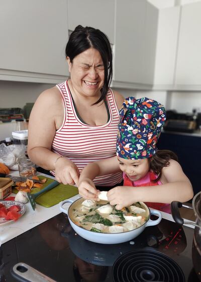 Hazel Chu cooking with daughter Alex during the summer