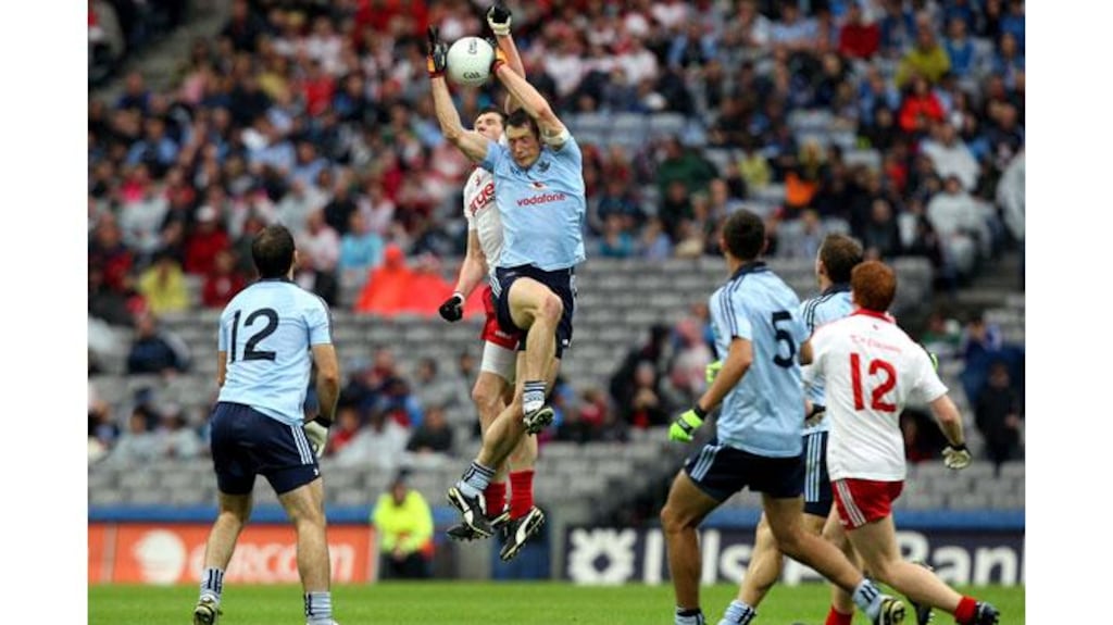 Dublin’s Denis Bastick and Seán Kavanagh of Tyrone contest the ball during the All-Ireland SFC quarter-final at Croke Park. – (Photograph: Ryan Byrne/Inpho)