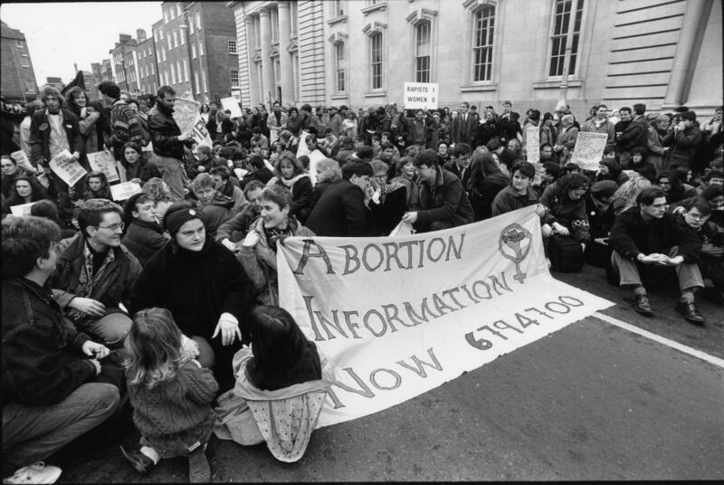 1992: The demonstration against the High Court injunction forbidding a 14-year-old alleged rape victim from obtaining an abortion in Britain reaches Government Buildings. Photograph: Eric Luke/The Irish Times