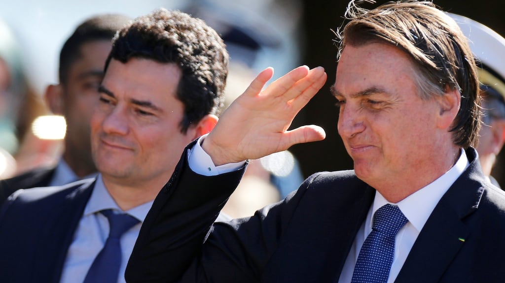 Brazil’s president Jair Bolsonaro (right) continues to back justice minister Sergio Moro despite the Car Wash investigation revelations. File photograph: Adriano Machado/Reuters