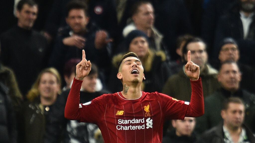 Liverpool’s Roberto Firmino celebrates scoring against Tottenham Hotspur. Photo: Getty Images
