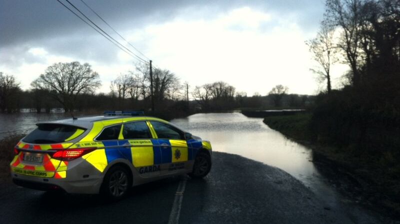 A road flooded on the Ballymacarberry side of Kilmanahan, Co. Waterford on Sunday. Photograph: An Garda Síochána/Twitter