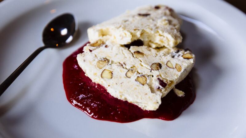 Nougat Glace with raspberry sauce. Photograph: Emma Jervis