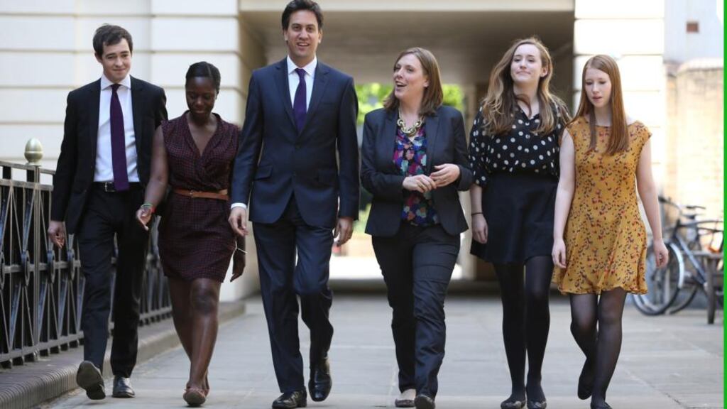 Calum Mulligan, Amy Fode, Labour leader Ed Miliband, prospective parlimentary candidate for Birmingham and Yardley Jess Phillips, Orla Oakey and Helen Dollimore walk into The St Bride Foundation n London yesterday.