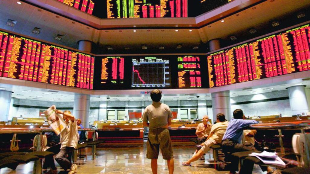 Asian markets gave up five-month highs as investors braced themselves for US jobs data that could decide whether the Federal Reserve will start withdrawing its stimulus this year. Photograph: AFP/AFP/Getty Images