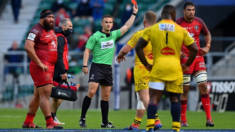 Match referee Luke Pearce shows a red card to Levani Botia of La Rochelle (not pictured). Photo: Dan Mullan/Getty Images