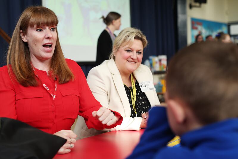 British deputy prime minister Angela Rayner and Labour candidate Karen Shore talk with pupils at Palace Fields Primary School in Runcorn. Photograph: Ryan Jenkinson/Getty