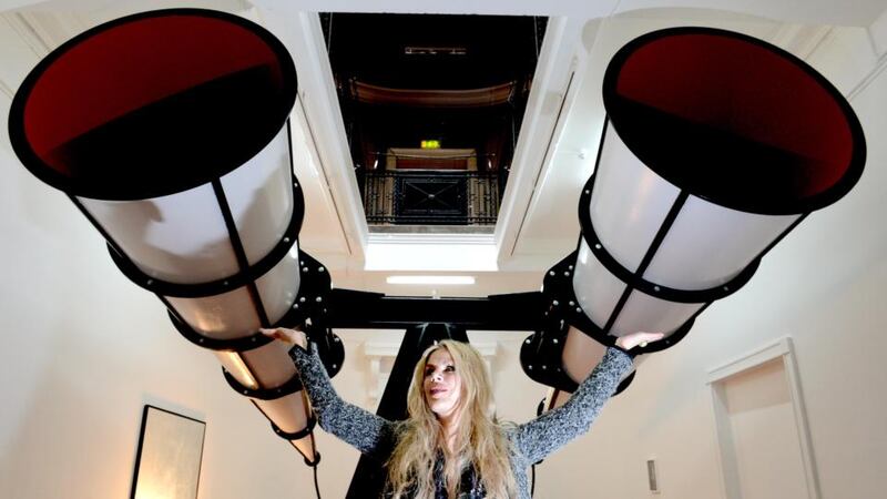 Rachael Thomas, head of exhibitions at Imma and co-curator of the exhibition I knOw yoU, with 3 Contributors to the theory of mass-aberrations in modern religions by artist Thomsa Zipp. Photograph: David Sleator