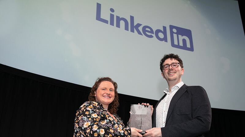 Dr Alison Connolly, Awards Judge, presents the Health & Safety Excellence Award - ICT to Darragh Feiritéar, Head of Judging, on behalf of LinkedIn EHS.