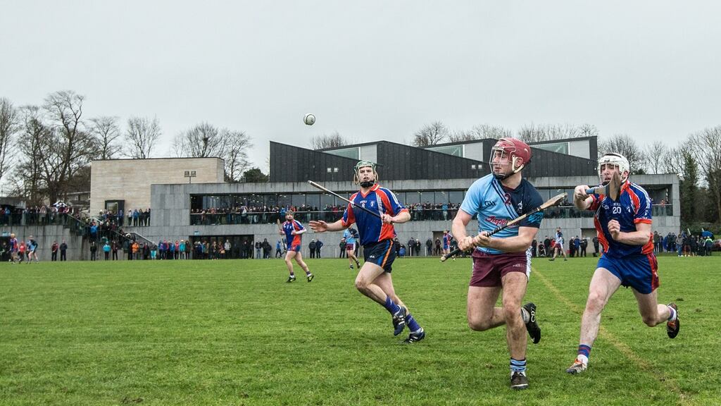 GMIT’s Declan Cronin and Seamus Kennedy of Mary Immaculate battle for the ball. Photo: James Crombie/Inpho