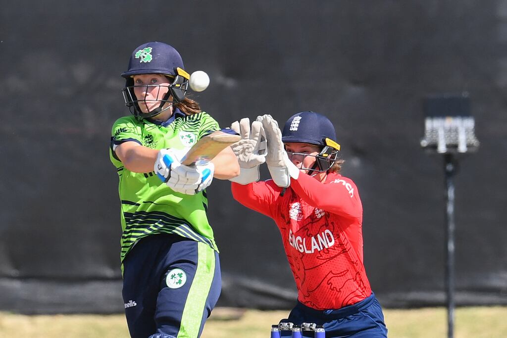 Ireland's Orla Prendergast watches the ball after playing a shot as England's wicketkeeper Heather Knight reacts during the Group B T20 Women's World Cup match at Boland Park in Paarl. Photograph: Rodger Bosch/AFP via Getty Images