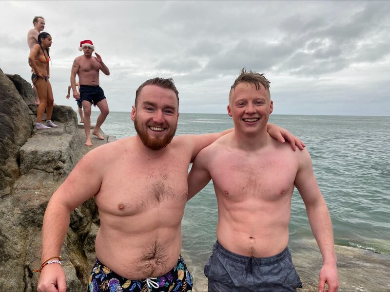 Laithaam Hudson and Seán Quinn at the Forty Foot in Sandycove on Christmas Day. Photograph: Fiachra Gallagher