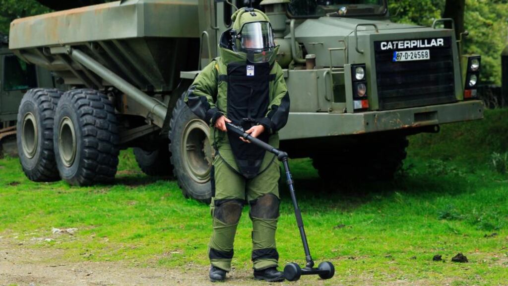 Emergency ordinance survey bomb disposal engineers take part in a training exercise as some of 130 soldiers from the 46th Infantry Group go through final preparations at the Glen of Imaal ahead of deployment to the United Nations Disengagement Observation Force in the Golan Heights region of Syria. Photograph: Brian Lawless/PA Wire.