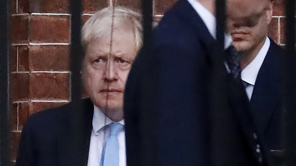 Britain’s Prime Minister Boris Johnson leaves from the rear of 10 Downing Street in central London on Wednesday night. Photograph: Tolga Akmen/AFP