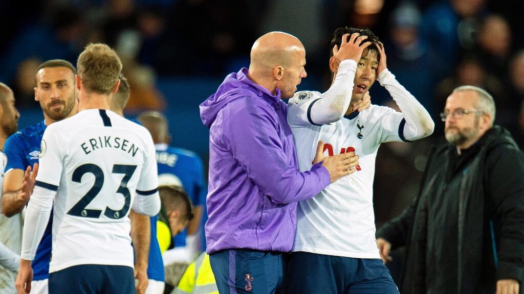Tottenham Hotspur’s Son Heung-min reacts after tackling Everton’s Andre Gomes during the Premier League game at Goodison Park. Photograph:  Peter Powell/EPA