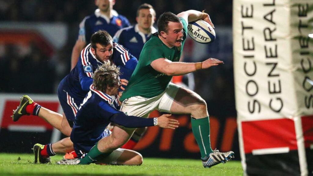 Ireland’s Peter Dooley makes a break against France. Photograph: James Crombie/Inpho