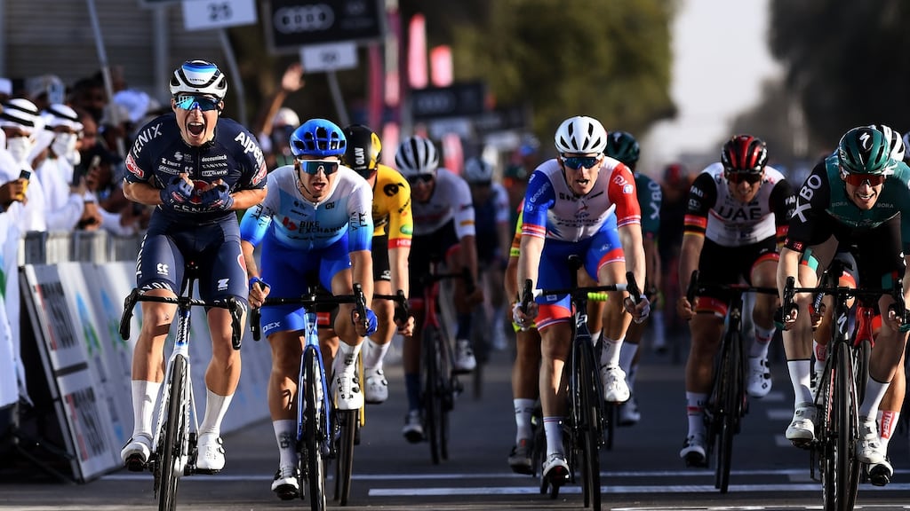 Jasper Philipsen of Team Alpecin-Fenix celebrates winning in the UAE, with Ireland’s Sam Bennett of Team Bora-Hansgrohe in second place. Photograph: Tim de Waele/Getty Images