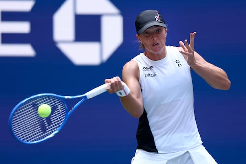 In-form Iga Swiatek survives scare to reach US Open third round