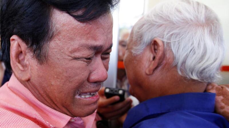 Former prisoner of the Khmer Rouge prisoner Soum Rithy (left) cries next to a survivor of the regime’s S-21 prison, Chum Mey, at the Extraordinary Chambers in the Courts of Cambodia in Phnom Penh, Cambodia, today. Photograph: Mak Remissa/EPA