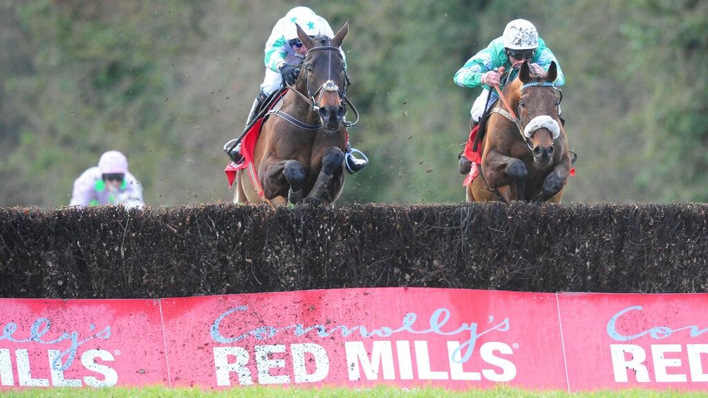 Our Duke and Robbie Power (left) win the Grade Two Red Mills Steeplechase from Presenting Percy at Gowran Park. Photograph: PA Wire