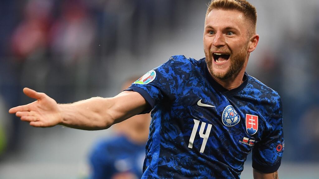 Milan Skriniar of Slovakia celebrates after scoring his team’s second goal during the Euro 2020 Group E match against Poland in St Petersburg. Photograph: Kirill Kudryavtsev/EPA