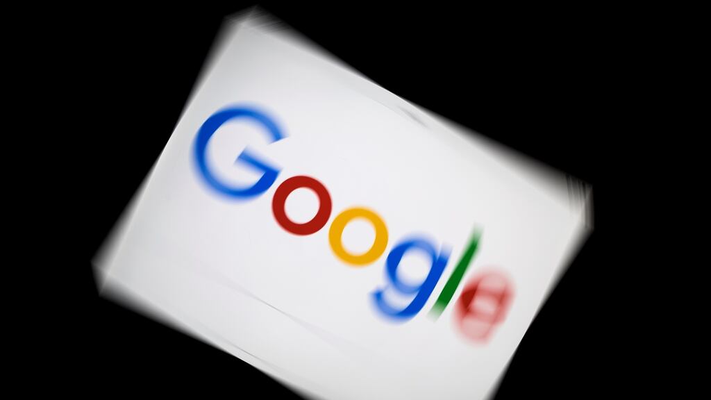 A Google logo displayed on a tablet in Paris. Photograph: LIONEL BONAVENTURE/AFP via Getty Images