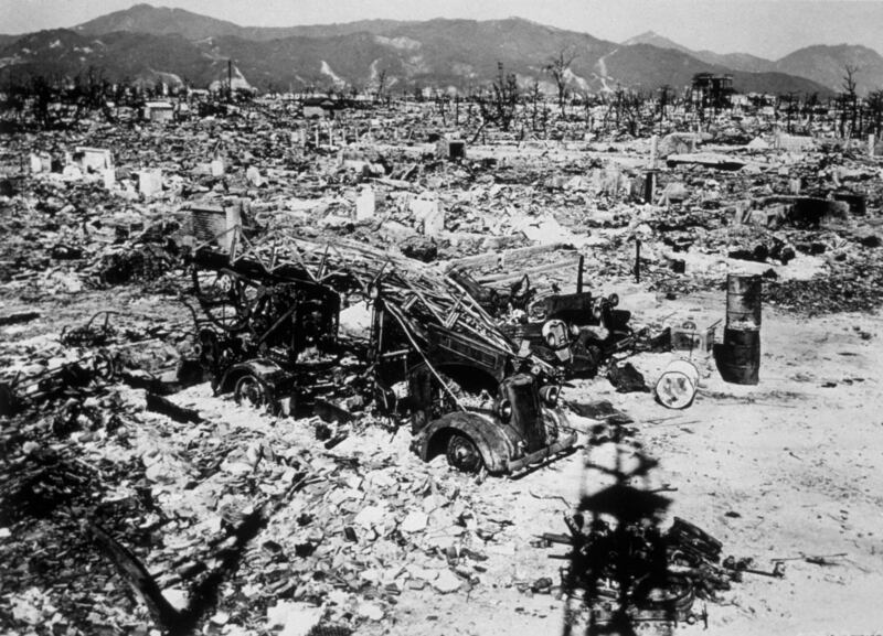 A burnt-out fire engine lies among the rubble after the atomic bombing of Hiroshima in 1945. Photograph: Keystone/Getty Images
