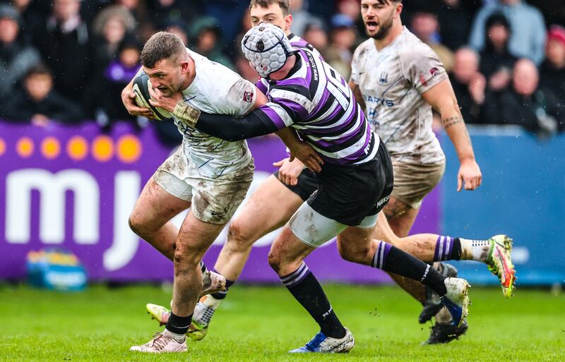 Cork Con’s Harry O’Riordan is tackled by Terenure’s Ashley Deane in last season's semi-final. Photograph: Nick Elliott/Inpho