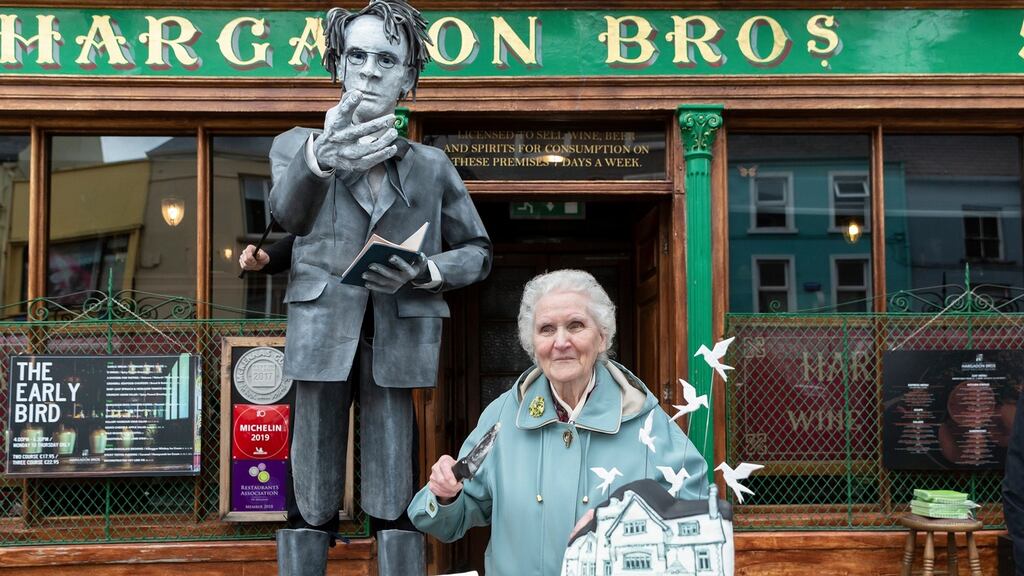 Joan Gleeson (81) cutting WB Yeats’s birthday cake on O’Connell Street, Sligo. Photograph: Donal Hackett