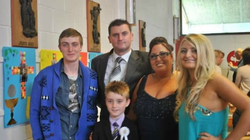 The Reck family: Thomas (left), husband Paul, the late Catherine, Grace (right) and Shane (front), in the last family photo they have together. File photograph: Paul Reck