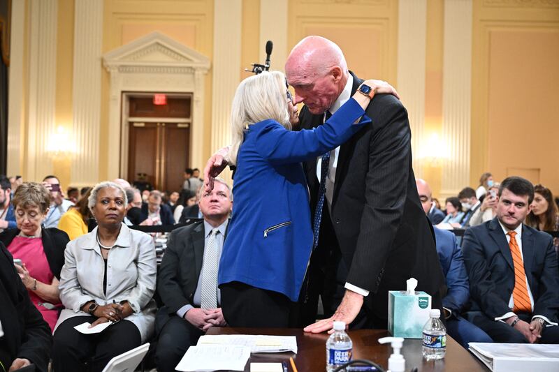 Republican Liz Cheney (left), vice-chairwoman of the committee investigating the January 6th attack on the US Capitol, hugs Rusty Bowers, Arizona House Speaker, during the fourth hearing in Washington, DC. Photograph: Mandel Ngan/AFP/Pool