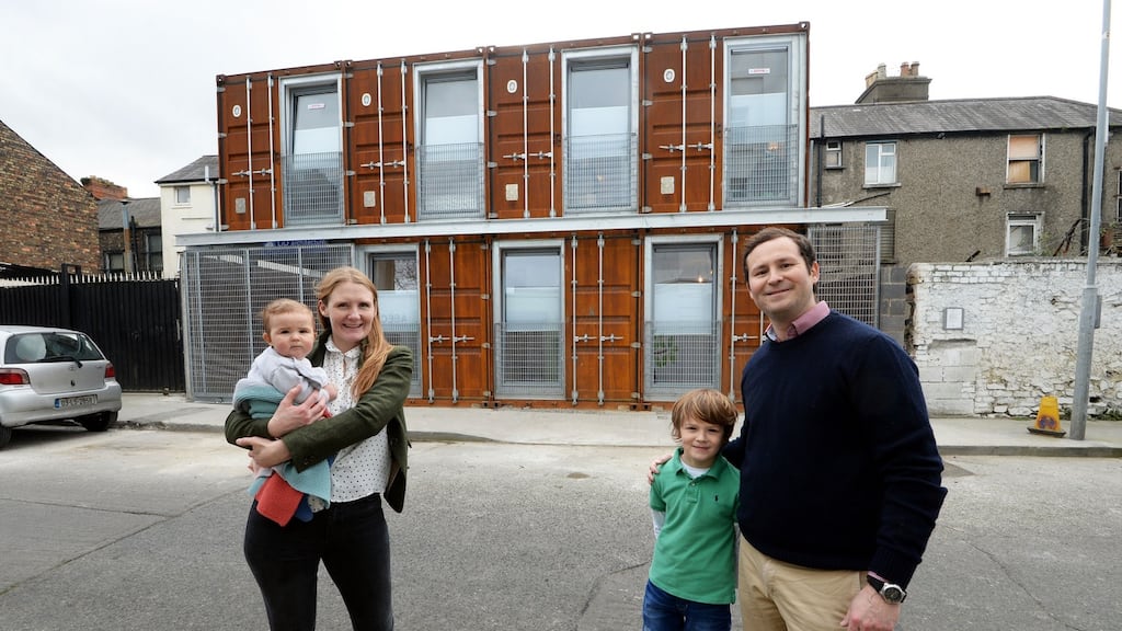 Self-contained: Maggie and Gordon and Kelley with their children Gordie (7) and Penny Bell (8 months) at their house built from shipping containers in Ringsend, Dublin. Photograph: Eric Luke