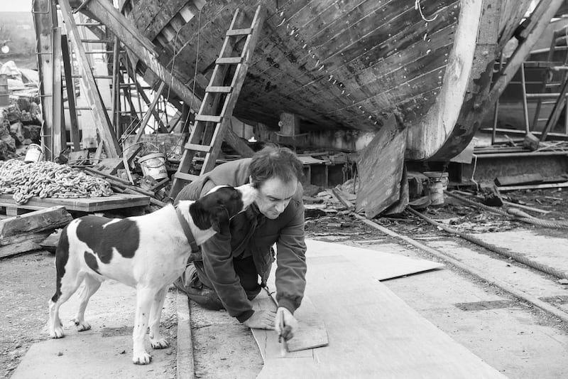 Jasper giving John Hegarty a helping hand