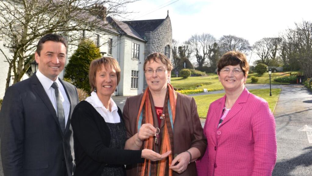 John Concannon and Jacquie Horan of Cope Galway accept the keys to the former laundry building from Sr Elizabeth Manning and Sr Caitlin Conneely of the Sisters of Mercy. Photograph: Joe Travers