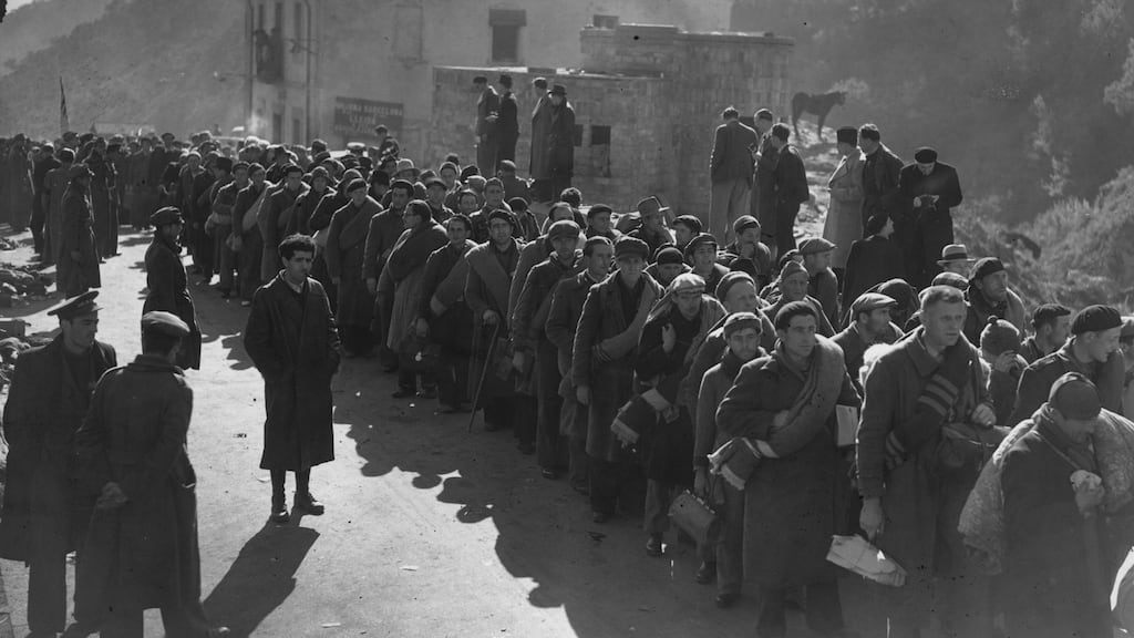 Some of the 3,000 members of the International Brigade entering the border town of Le Perthus with the retreating republican army, during the Spanish civil war. Photograph: Keystone/Getty Images