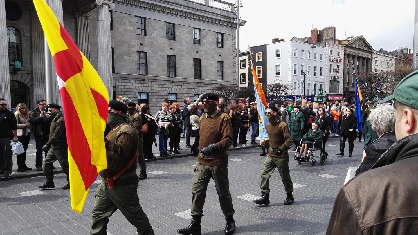 A paramilitary colour party marches down O’Connell Street as part of the Republican Sinn Féin 1916 parade, opposite the GPO, April 23rd, 2016.