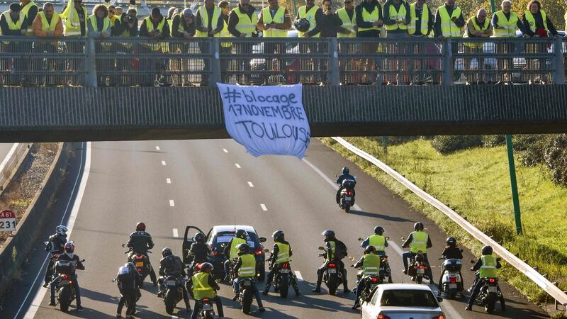 Yellow vest demonstrators block the road in Toulouse, southern France. Photograph: Paschal Pavini/AFP/Getty Images
