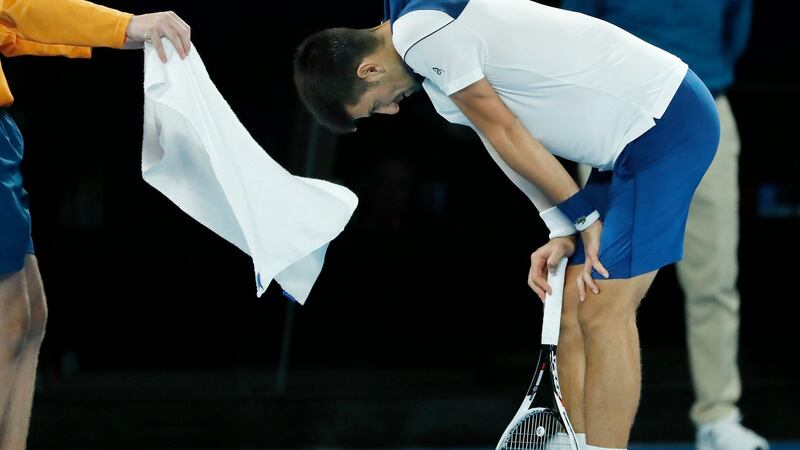 Djokovic reacts during his loss. Photo: Mast Irham/EPA