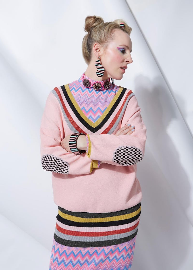 Joanne Hynes for Dunnes Stores: zigzag knit dress €100, pink V-neck jumper €90, graphic-stripe ear-rings €15