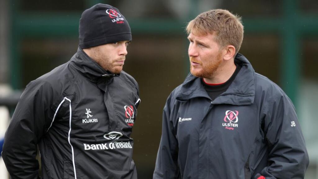 Jonny Bell, seen here taking to Ulster centre Darren Cave, will join Gloucester from next season with former Waratahs defence coach Joe Barakat joining the province as an assistant coach. Photograph: Darren Kidd/Inpho/Presseye