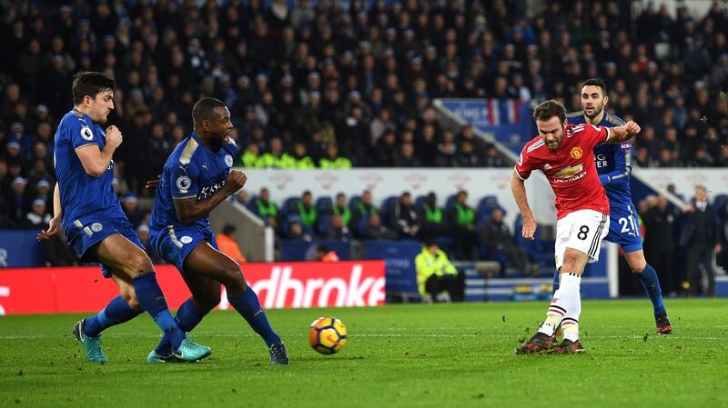 Juan Mata scores Manchester United’s opening goal during the Premier League match against Leicester City at The King Power Stadium. Photograph: Michael Regan/Getty Images