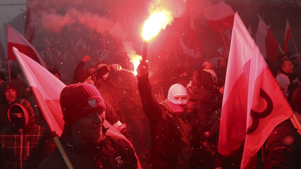Nationalists march in large numbers through the streets of Warsaw to mark Poland’s Independence Day on Friday. Photograph: Czarek Sokolowski/AP