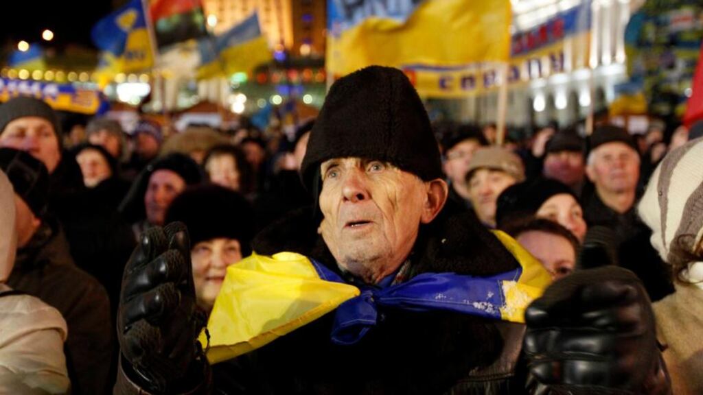 Thousands turned out at Independence Square in Kiev yesterday as Ukraine president Viktor Yanukovich flew to Russia to meet Vladimir Putin. He is said to be seeking Moscow aid to shore up a creaking economy while engaging in a U-turn away from a deal with the EU. Photograph: Vasily Fedosenko/Reuters