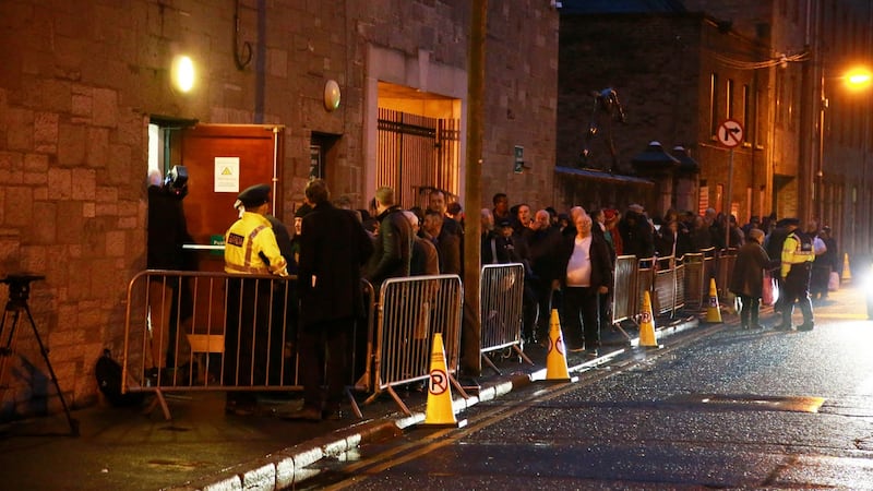 People queueing for free food hampers  outside the Capuchin Day Centre on Dublin’s Bow Street on Friday.  Photograph Nick Bradshaw.