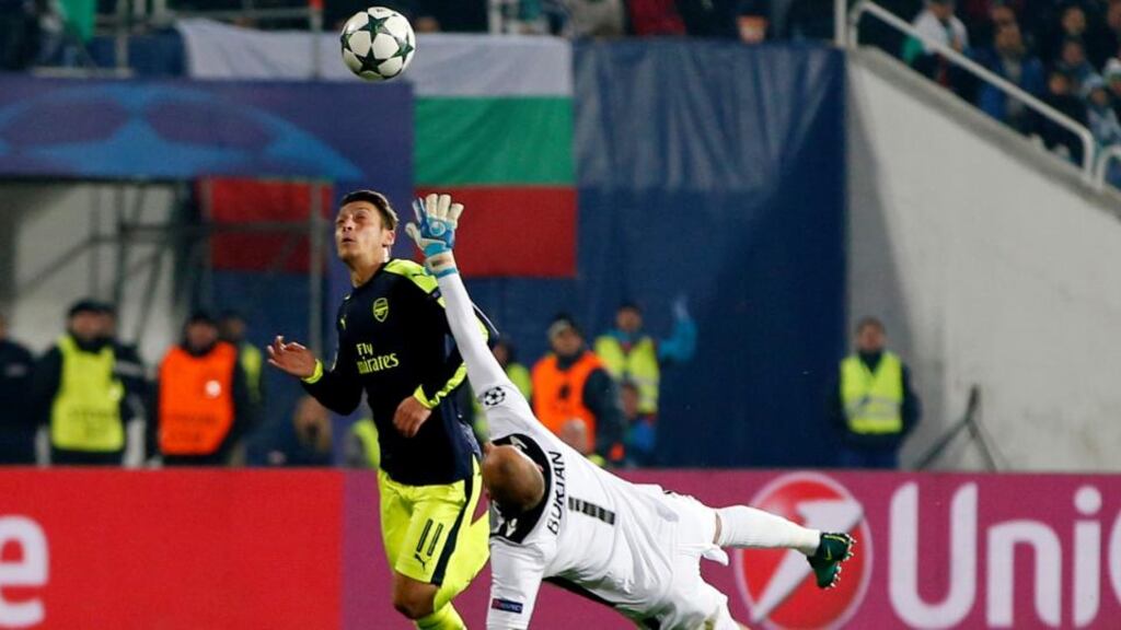 Arsenal’s Mesut Özil lobs Ludogorets Razgrad’s goalkeeper Milan Borjan before scoring their third goal during the Champions League Group A game at the Vasil Levski National Stadium in Sofia, Bulgaria. Photograph: Paul Childs/Action Images via Reuters/Livepic