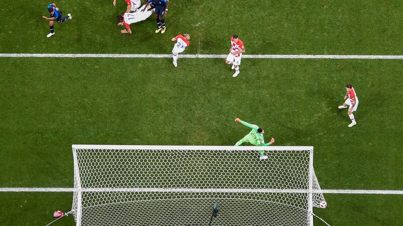 Croatia’s Mario Mandzukic heads the ball and scores an own goal in the World Cup final against France at the Luzhniki Stadium in Moscow. Photograph: Gabriel Bouys/AFP/Getty Images
