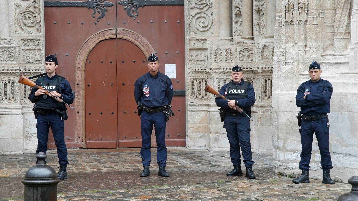 Armed French police take position outside the Cathedral in Rouen, France, during a funeral service in memory of slain French parish priest Father Jacques Hamel at the Cathedral in Rouen, France, August 2nd, 2016. FrJacques Hamel was killed last week in an attack on a church at Saint-Etienne-du-Rouvray near Rouen that was carried out by assailants linked to Islamic State. Photograph: Jacky Naegelen/Reuters