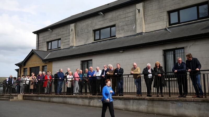 Big Tom: people queue to pay their respects at Oram Gaelic Football Club. Photograph: Brian Lawless/PA Wire