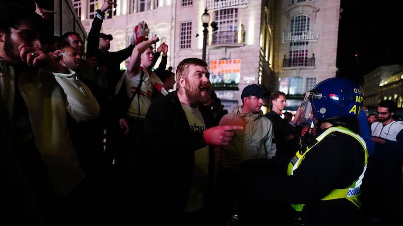 England fans clash with police in Piccadilly Circus after Italy beat England on penalties at Wembley. Photograph: Victoria Jones/PA Wire