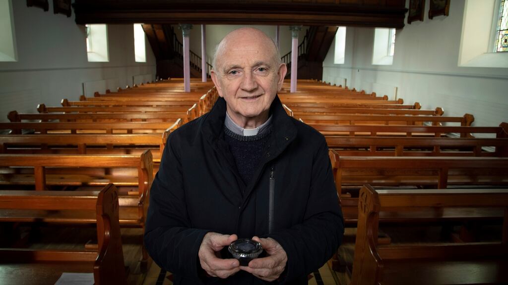 Fr Brian Brady with the last container of ashes in St Mary’s Church in Clonmany, Co Donegal. Photograph: Joe Dunne